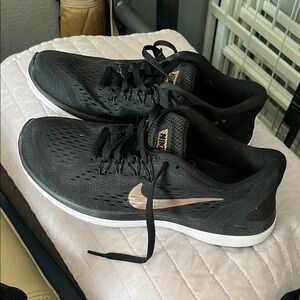 Nike Black and Rose Gold Athletic Shoes